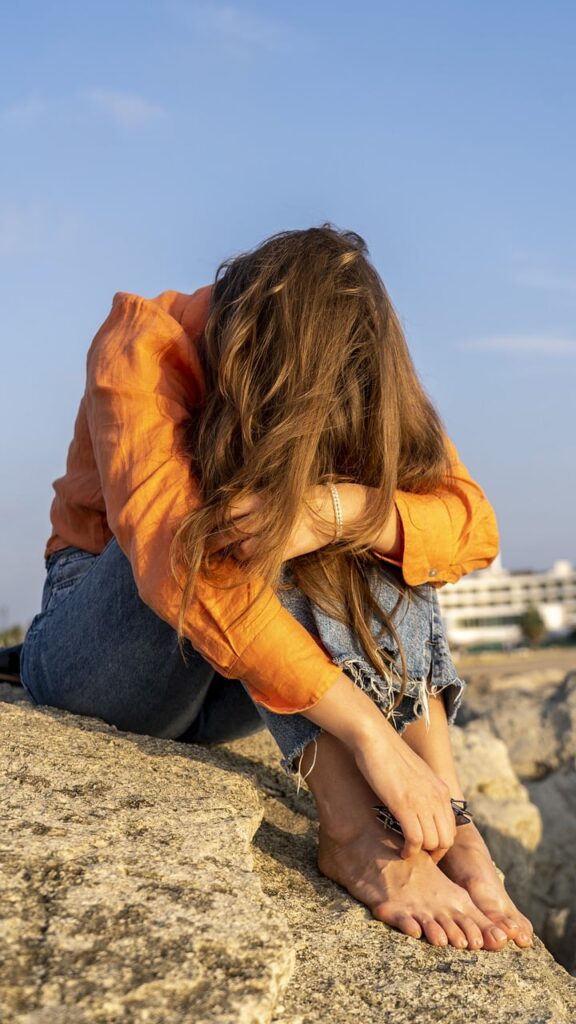 woman, sitting, upset, sad, mourning, outside, hiding, depressed, alone, rock, upset, upset, upset, upset, upset, hiding, depressed